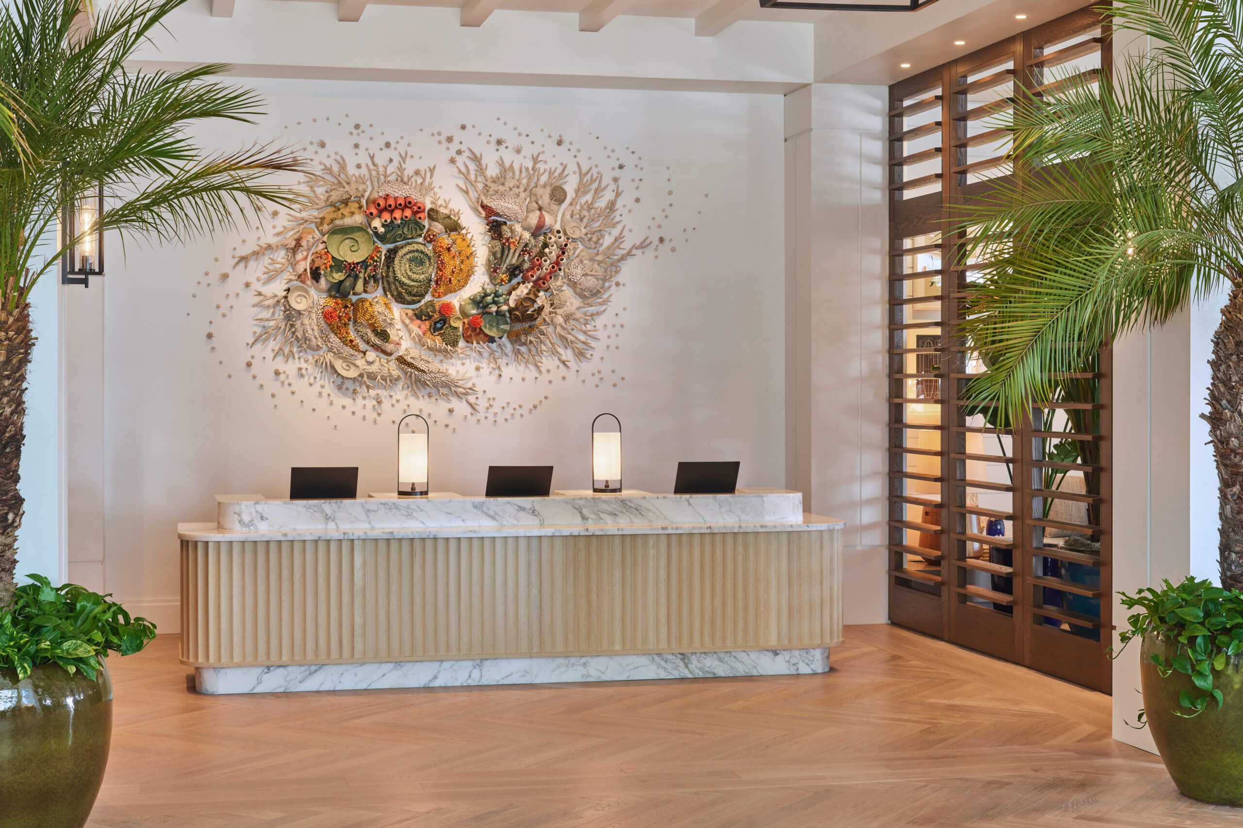 Beautiful front desk with artistic wall