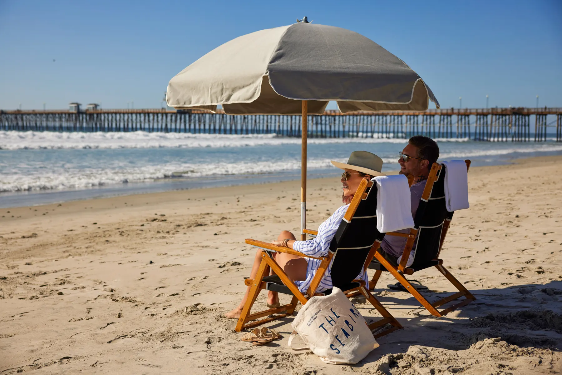 couple overlooking the deep blue sea