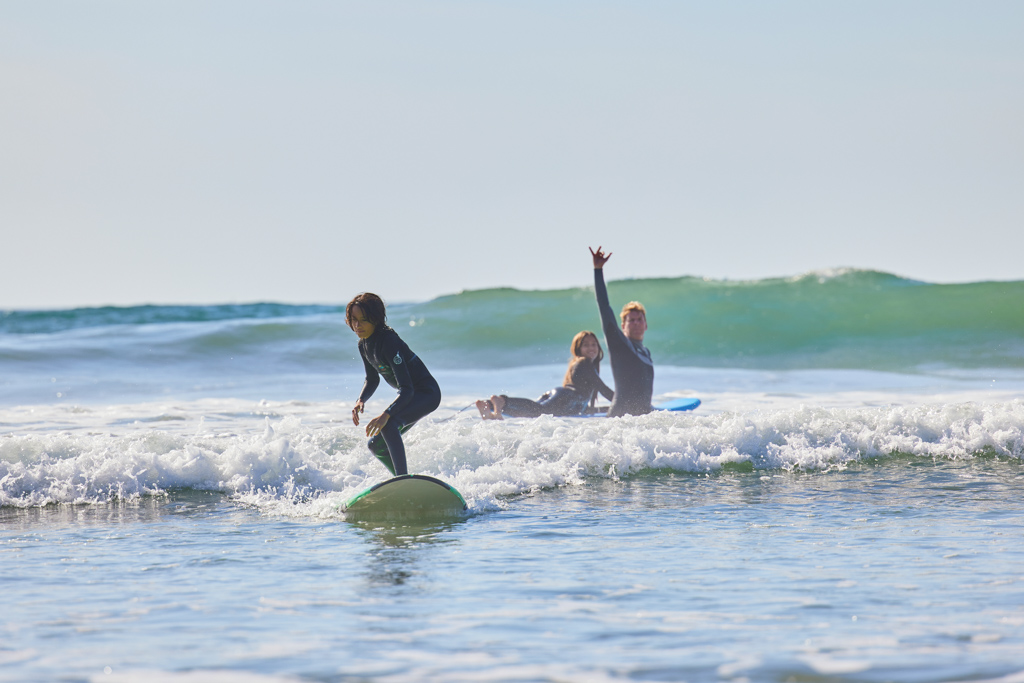 Family surfing in Oceanside