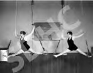 Girls on trapeze rope