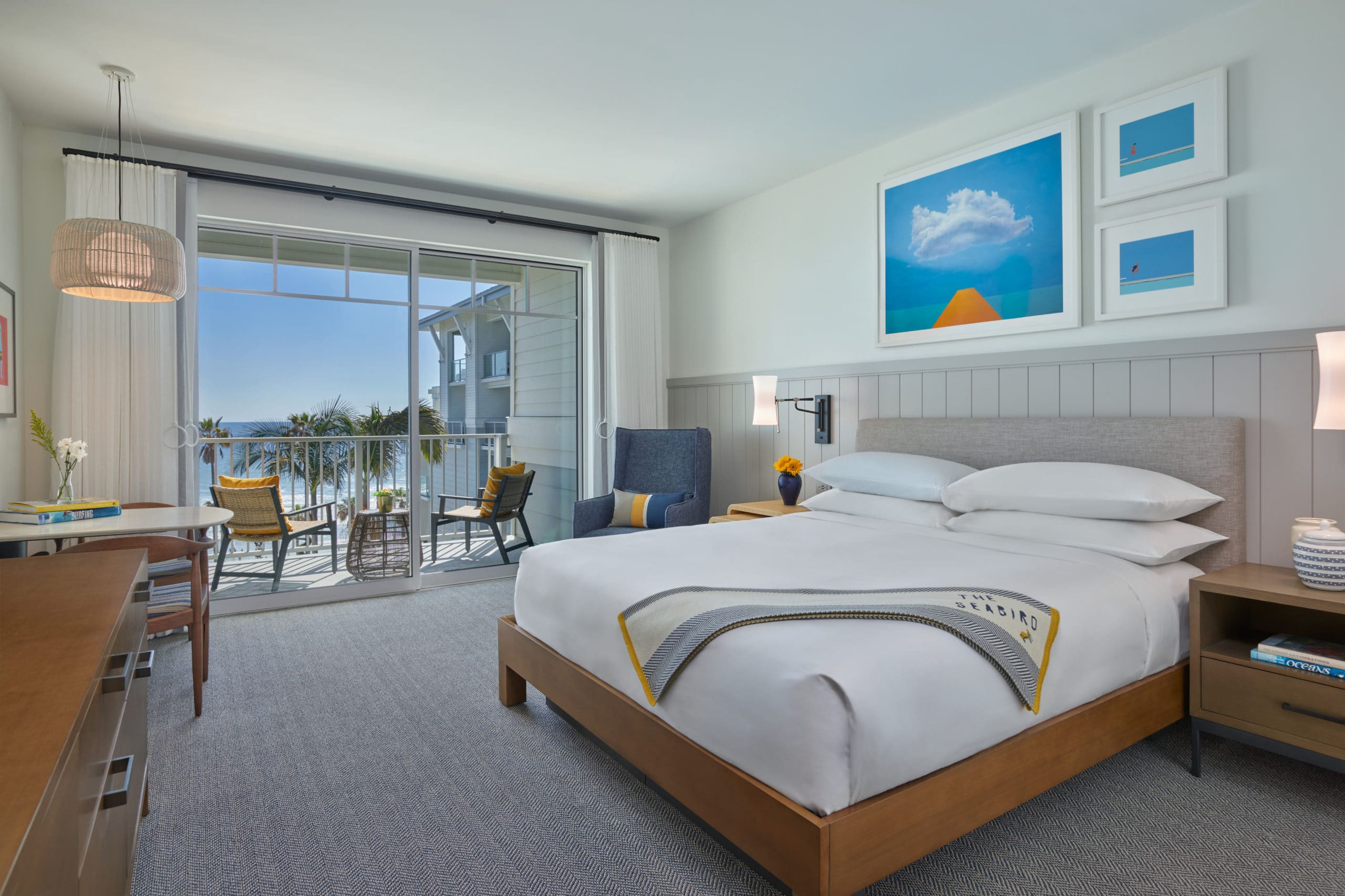 Bed with white sheets and great ocean views