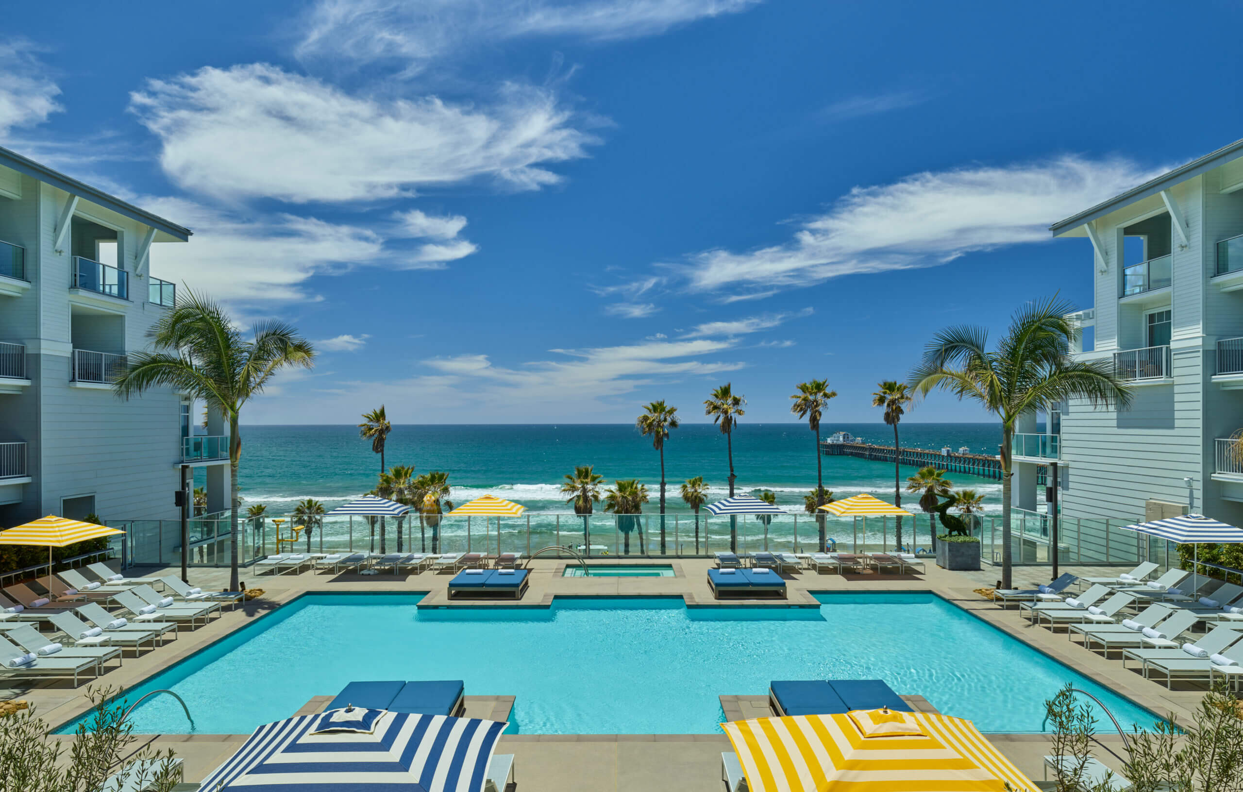 Pool deck of Oceanside with Palm Trees
