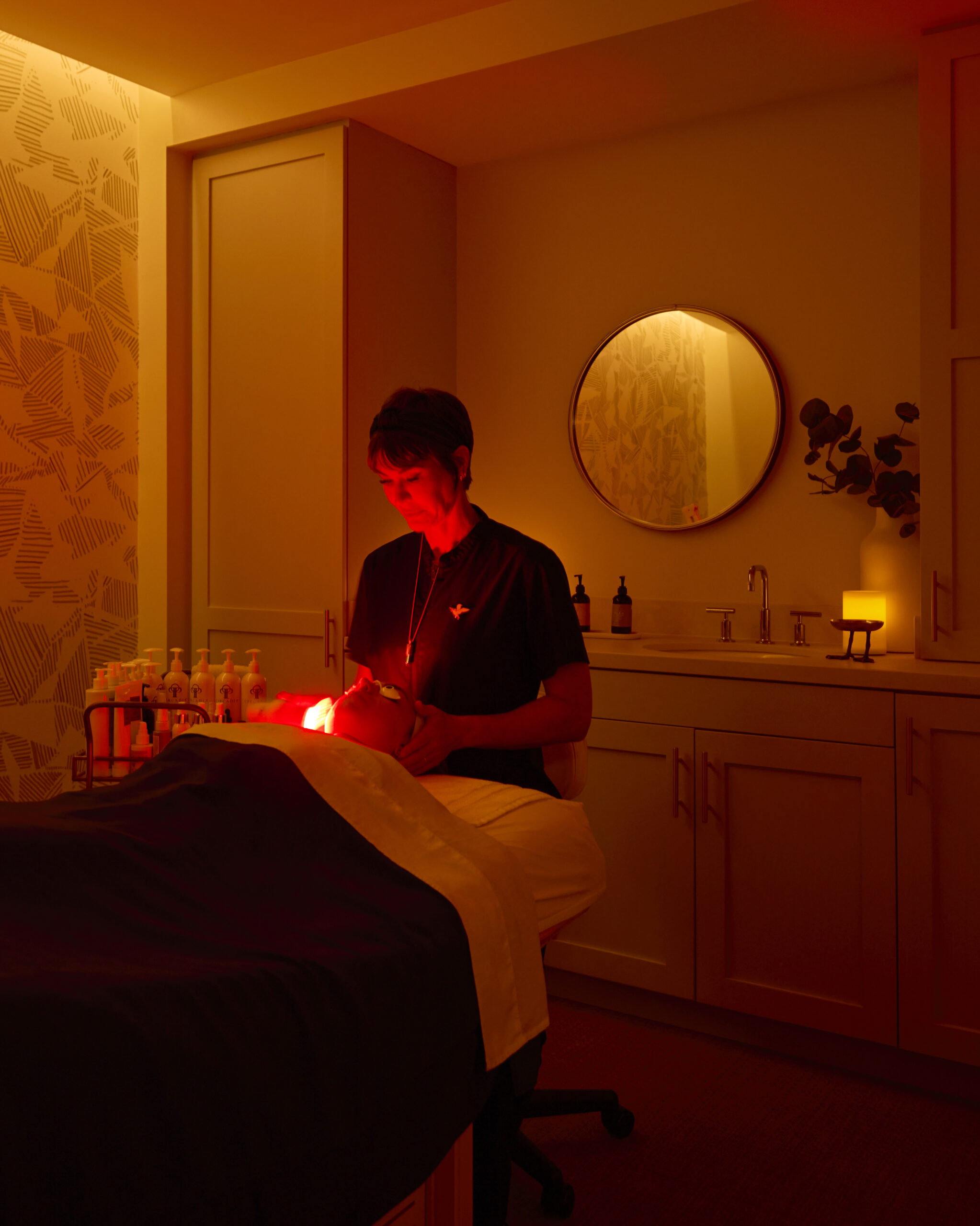 Red light facial therapy at Sunny’s Spa in The Seabird Resort, with warm ambiance, modern décor and premium skincare.