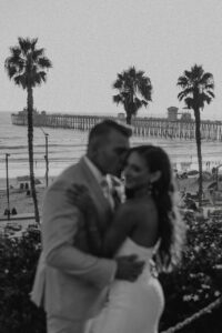 Wedding Couple in Front of the pier in Black and White